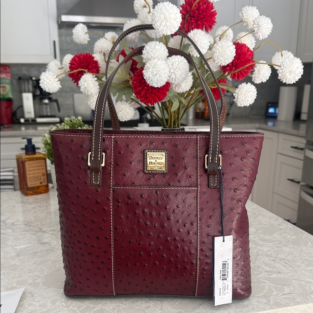 Dooney & Bourke burgundy/brown T’moro small ostrich Lexington